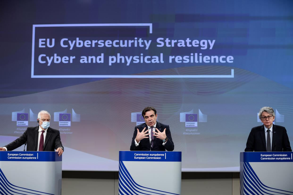 European Commission vice-presidents Margaritis Schinas and Josep Borrell, and EU Commissioner for Internal Market Thierry Breton attend a news conference on the EU's cybersecurity strategy, in Brussels, Belgium December 16, 2020.