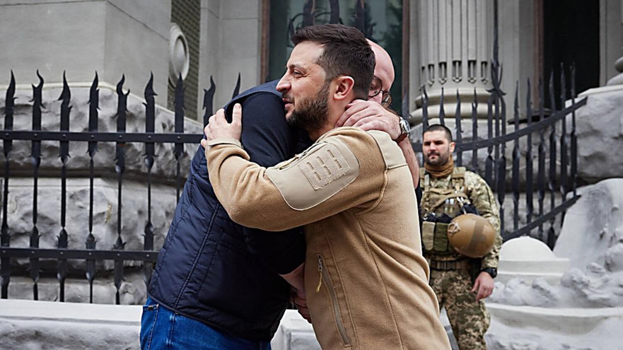 Photo of EU President Michel hugging Ukrainian President Zelenskiy during an April visit to Kyiv