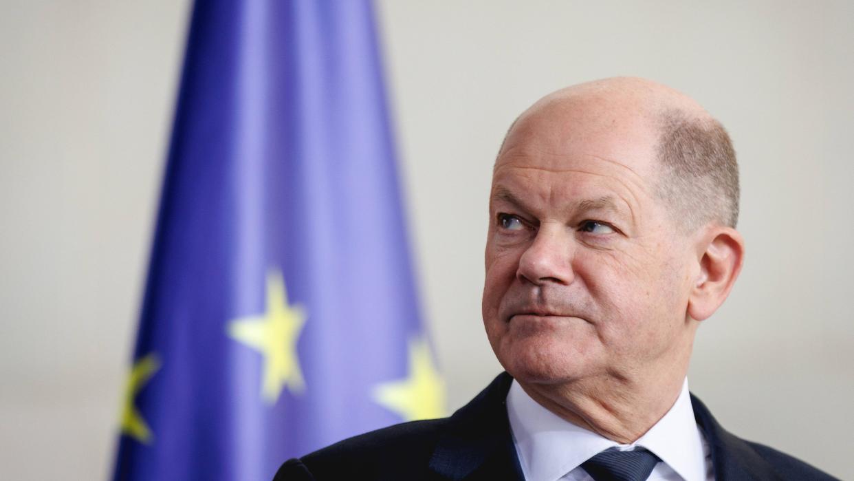 German Chancellor Olaf Scholz with EU flag in background at a press conference in Berlin on April 29, 2024