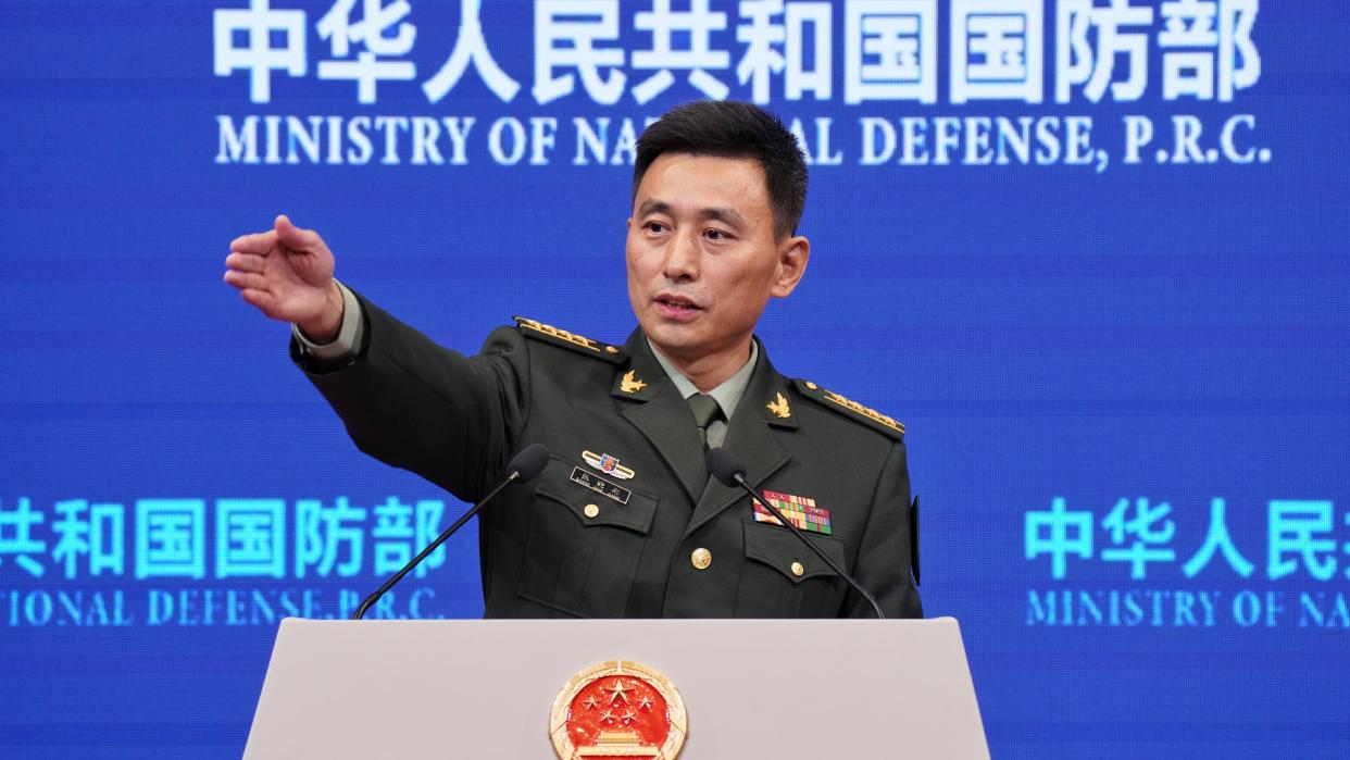 BEIJING, CHINA - OCTOBER 30: Senior Colonel Zhang Xiaogang, spokesperson for China s Ministry of National Defense