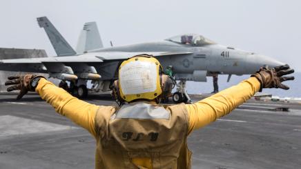 Fighter jet on the deck of an aircraft carrier