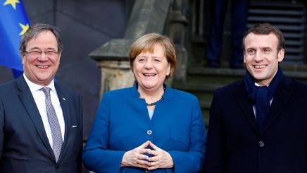 Armin Laschet, Angela Merkel, and Emmanuel Macron
