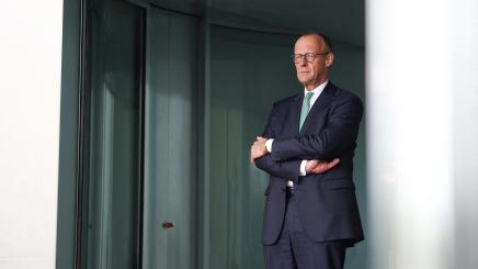 German Chancellor Friedrich Merz waits to welcome Swiss President Karin Keller-Sutter, at the Chancellery in Berlin, Germany, September 2, 2025.