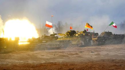 Polish PT-91 Twardy, German Leopard 2 and Italian Ariete tanks of NATO Enhanced Forward Presence battle groups attend live fire exercise, during Iron Spear 2022 military drill in Adazi, Latvia November 15, 2022.