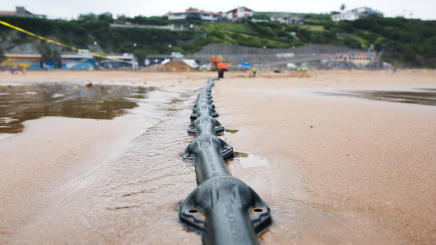 Final installation of Marea transatlantic undersea cable on shore in Bilbao, Spain.