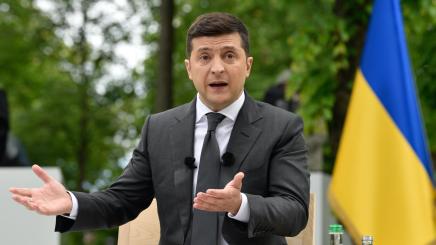 Photo of Volodymyr Zelenskyi speaking at a press conference on the first anniversary of his presidency