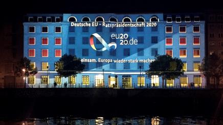 Photo of logo of Germany's EU Council presidency projected onto a government building during Berlin's Festival of Lights in September 2019