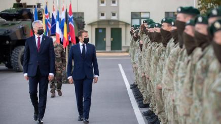 Image: Lithuanian President Gitanas Nauseda (1st L, Front) and French President Emmanuel Macron (2nd L, Front) inspect the NATO multinational battalion in Rukla, Lithuania, on Sept. 29, 2020.