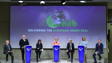 European Commission President Ursula von der Leyen (4th L) and European Commission Executive Vice-President Frans Timmermans (2nd L) attend a press conference with commissioners in Brussels, Belgium, on July 14, 2021.