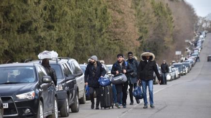 March 1, 2022, Lviv, Ukraine: Foreigners walk to Shehyni checkpoint to cross Ukrainian-Polish border due to Russian aggression.