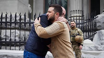 Photo of EU President Michel hugging Ukrainian President Zelenskiy during an April visit to Kyiv