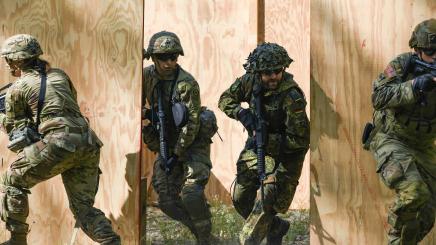 U.S. Soldiers with Regimental Engineer Squadron (RES), 2nd Cavalry Regiment and German Soldiers with Panzerbrigade 12 enter and clear a room during Pioneer Challenge at the 7th Army Training Commands Grafenwoehr Training Area, Germany, May 13, 2022.