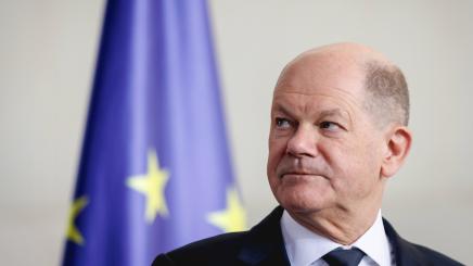 German Chancellor Olaf Scholz with EU flag in background at a press conference in Berlin on April 29, 2024