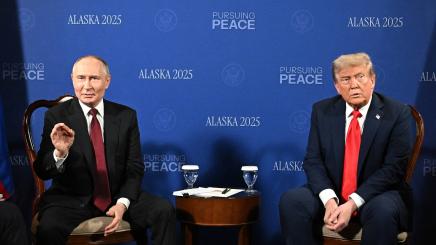 Vladimir Putin and Donald Trump attending a meeting at Joint Base Elmendorf-Richardson in Anchorage, Alaska on August 15, 2025
